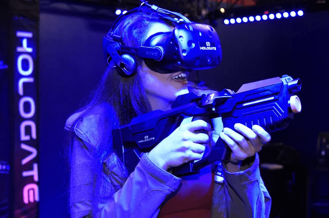 Woman playing Hologate Virtual Reality at Shenaniganz