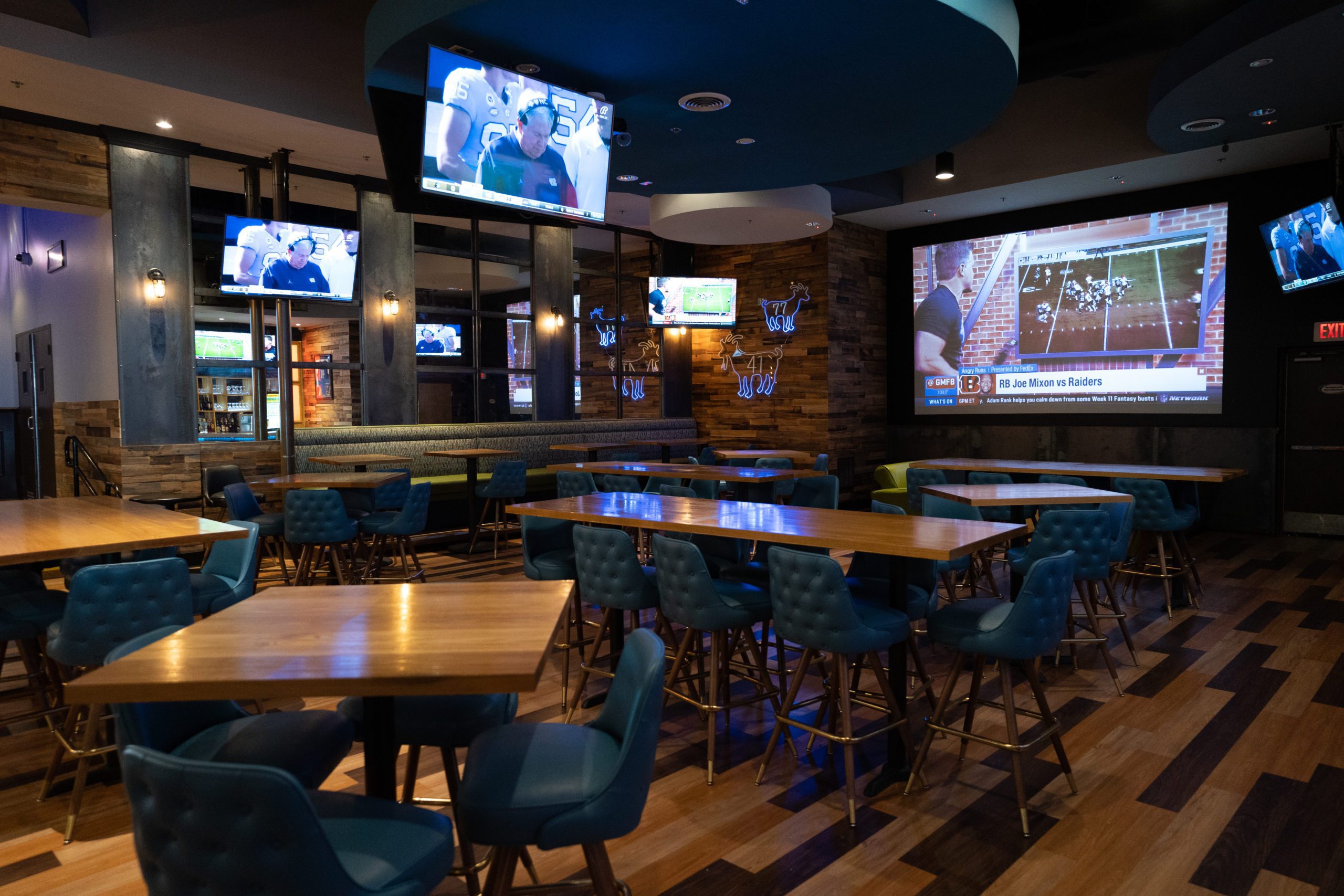 Rozie's Sports Bar with tables and tv's is the Best place to watch football